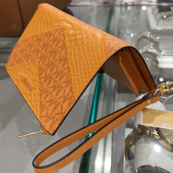 MICHAEL KORS JST LG DOUBLE ZIP WRISTLET WALLET PHONE HOLDER 
CIDER
NWT - Picture 14 of 16